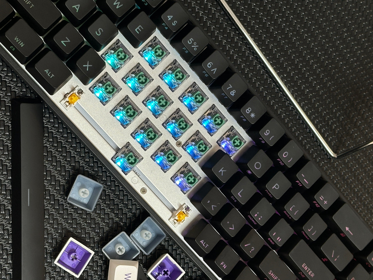 Custom nanomaterial mechanical keyboards showcasing colorful key switches and unique keycaps