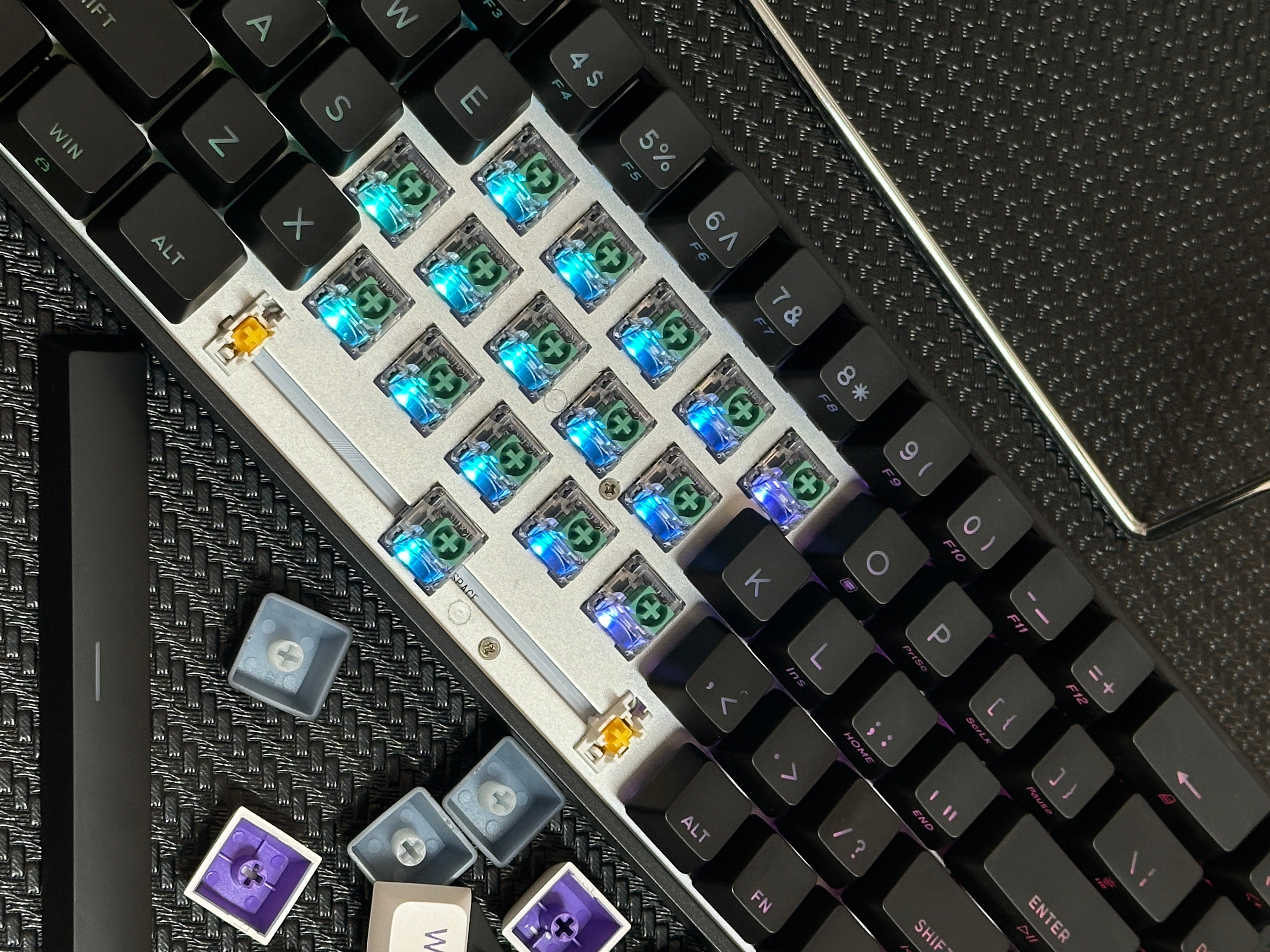 Custom nanomaterial mechanical keyboards showcasing colorful key switches and unique keycaps