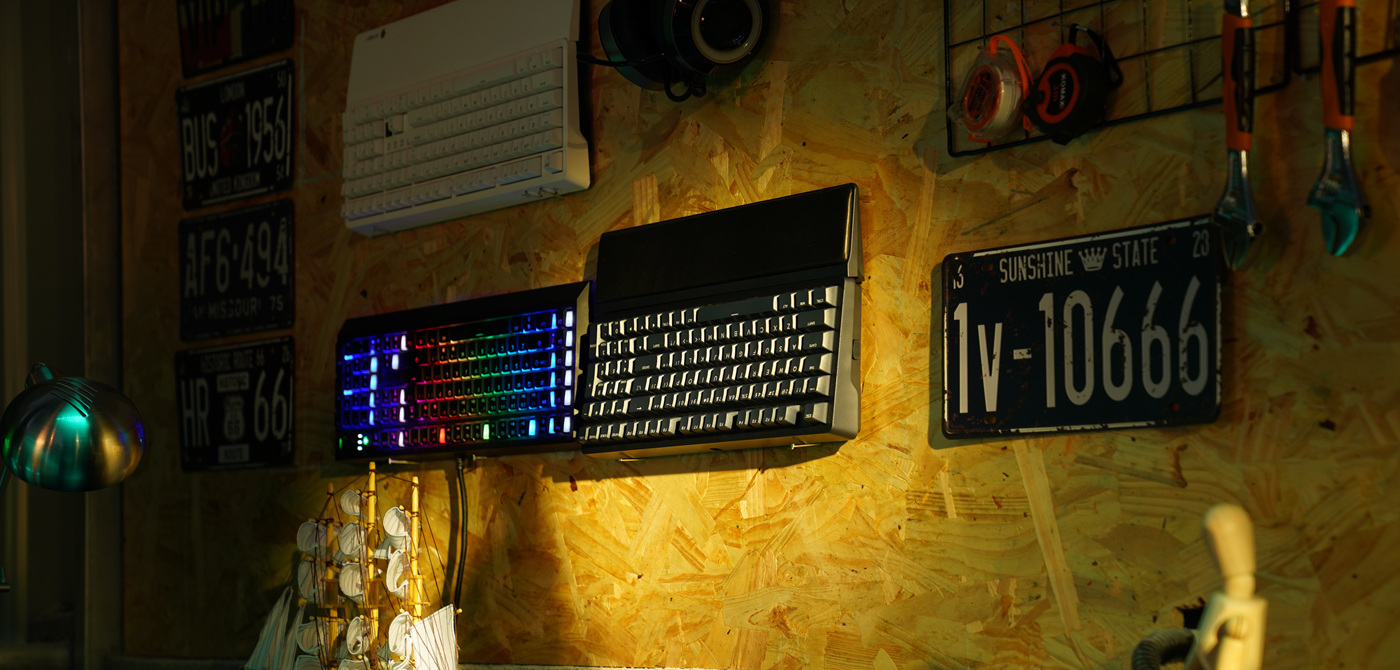 Display of mechanical keyboards with sound-dampening features in a stylish workspace environment